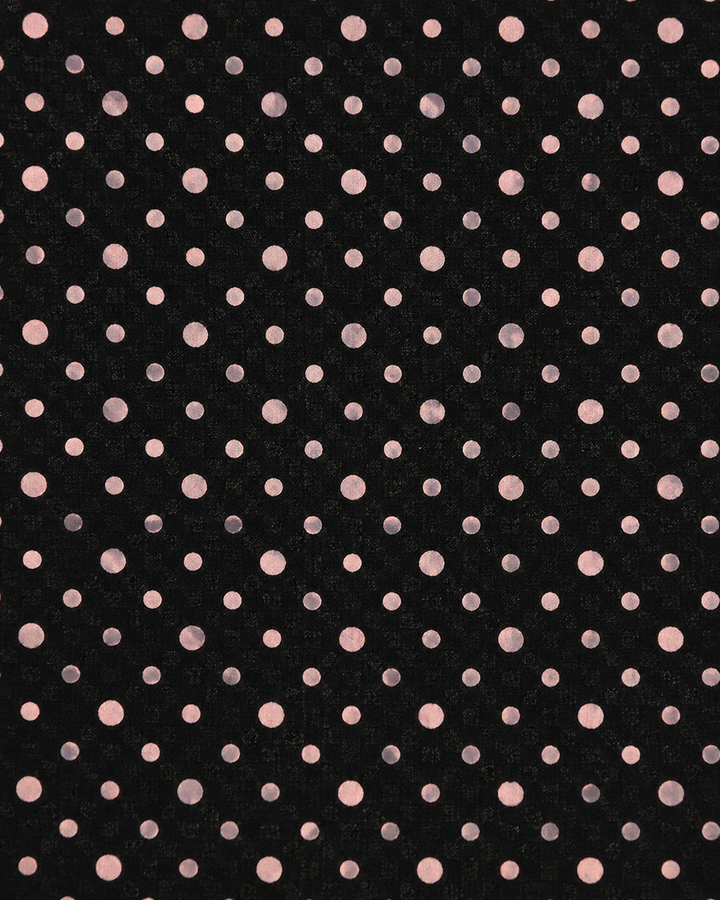 Närbild av prickigt mönster på KAPPA, bröstnäsduk i svart och rosa