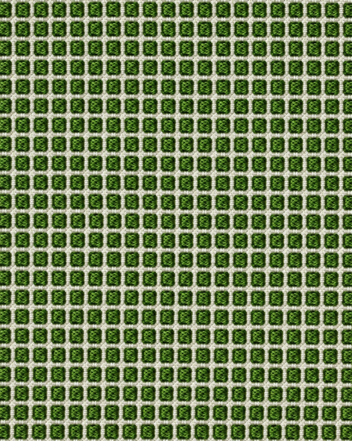 Närbild av ett tätt upprepat mönster av små ljusa geometriska prickmotiv på grön botten på TURTLE, bred slips i grönt och ljusa toner